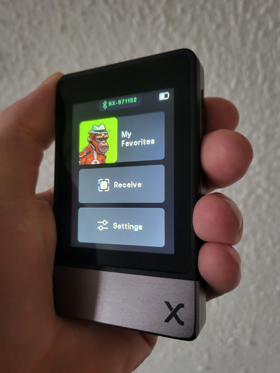 SecuX Neo X hardware wallet showing Galactic Ape NFT set as profile picture on the device screen.