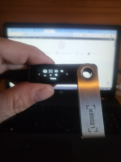 Ledger Nano S Plus hardware wallet displaying Tron app
