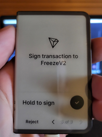 Ledger Stax screen displaying transaction signing to freeze TRX for staking.